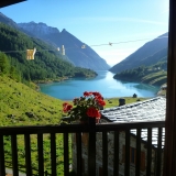 Vue sur le Lac Place du Moulin depuis l'Auberge de Prarrayer